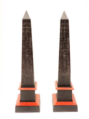 Lot 99 - A PAIR OF GRAND TOUR STYLE FAUX MARBLE OBELISKS of tapering form with hieroglyph motifs and square