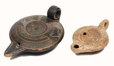 Lot 124 - A ROMAN POTTERY OIL LAMP