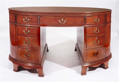 Lot 148 - A MAHOGANY OVAL DESK
