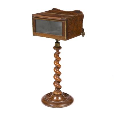 Lot 186 - A VICTORIAN WALNUT STEREOSCOPIC VIEWER on a barley twist column and circular base with brass