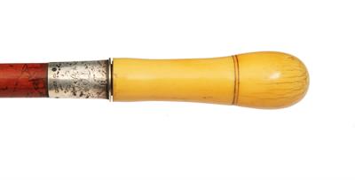 Lot 211 - A 19TH CENTURY IVORY HANDLED WALKING CANE