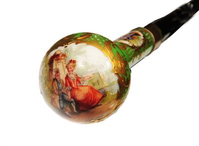 Lot 212 - A 19TH CENTURY PORCELAIN HANDLED WALKING CANE