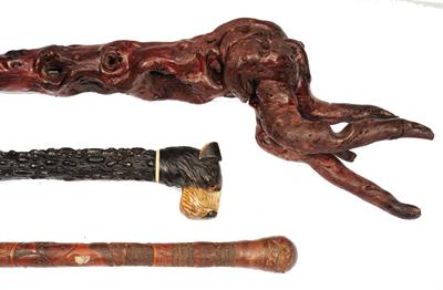 Lot 214 - A CARVED AND PAINTED SOFTWOOD WALKING CANE