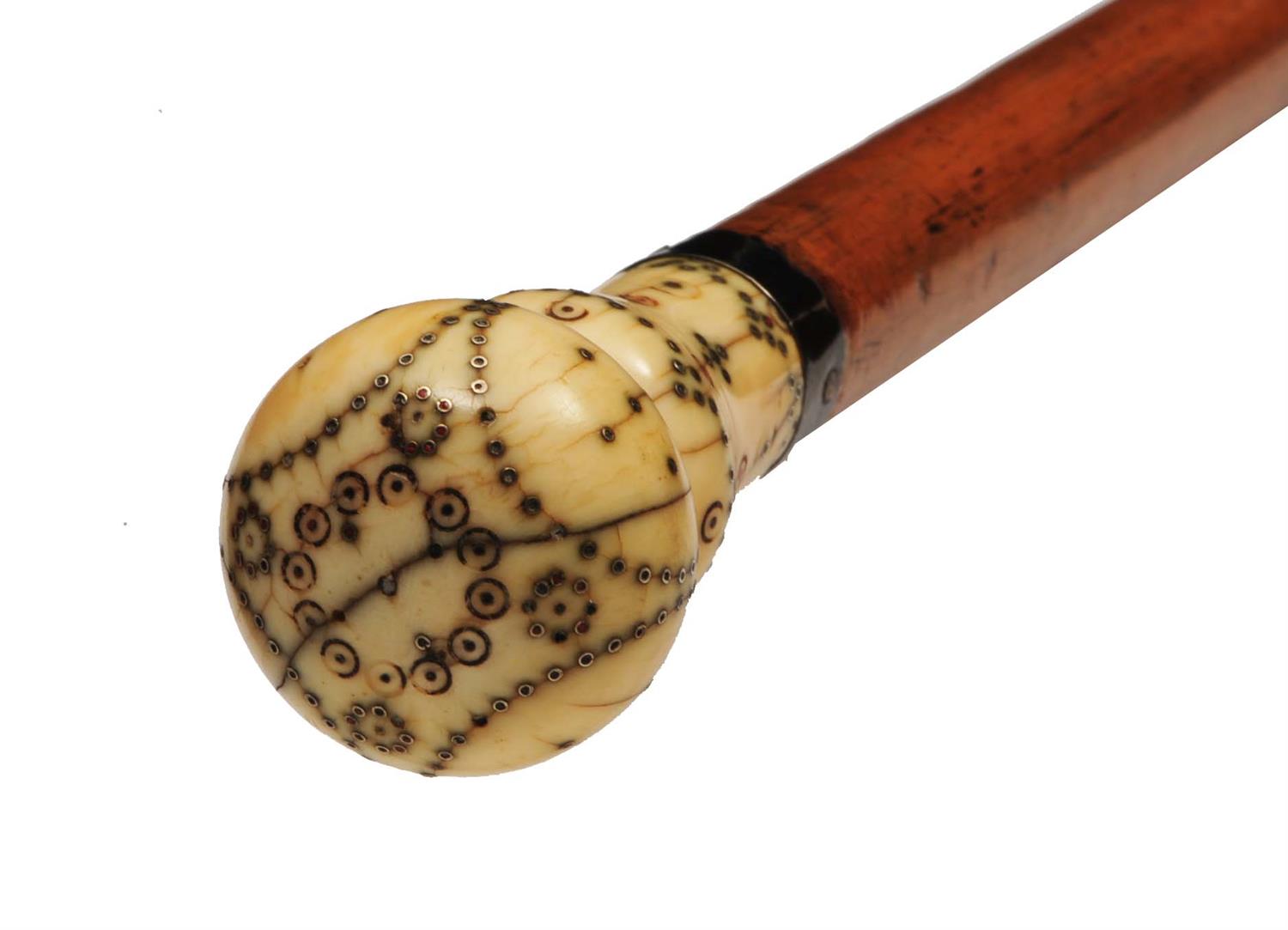 Lot 224 - AN 18TH CENTURY IVORY AND PIQUÉ WORK DANDY CANE