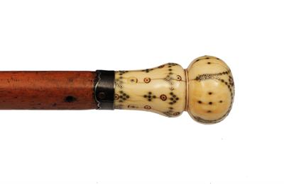 Lot 224 - AN 18TH CENTURY IVORY AND PIQUÉ WORK DANDY CANE