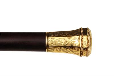 Lot 227 - A 19TH CENTURY GOLD MOUNTED WALKING CANE