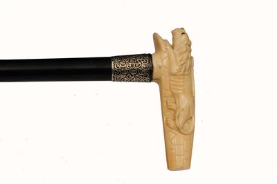 Lot 233 - AN EDWARDIAN IVORY HANDLED WALKING CANE