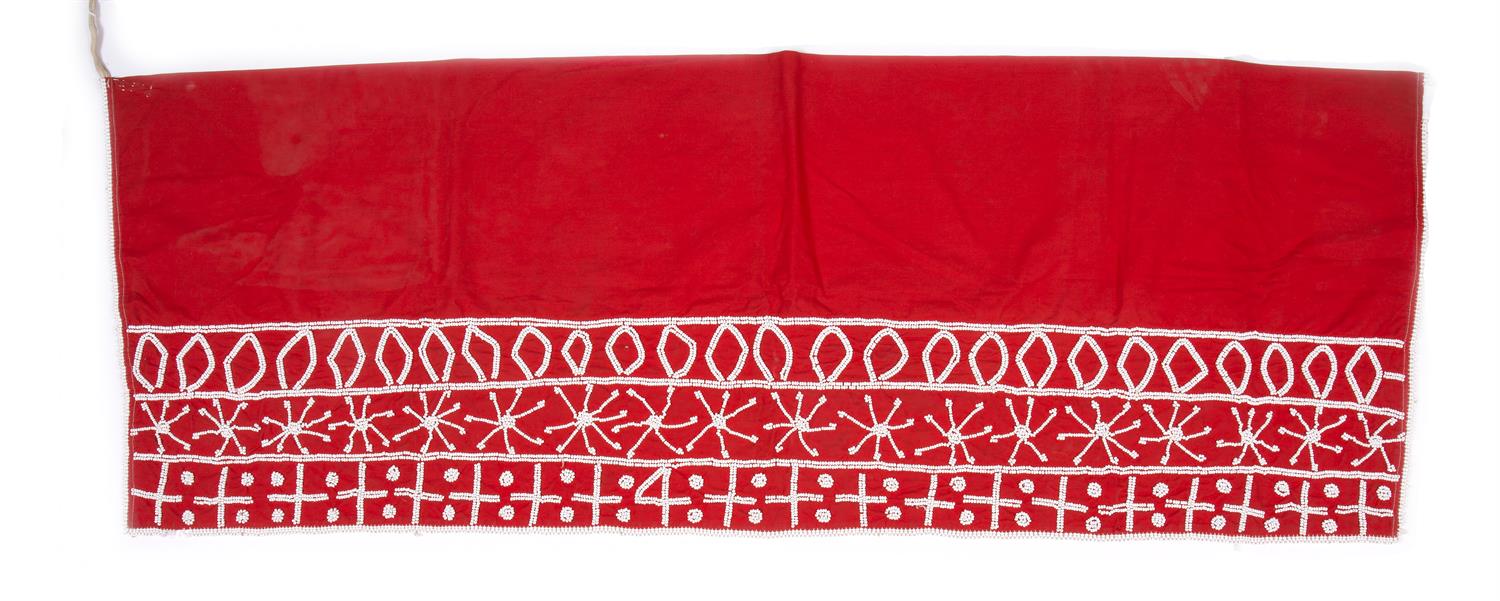 Lot 255 - A SHANGAAN SANGOMA'S SKIRT with three horizontal rows of white beads decorated cross