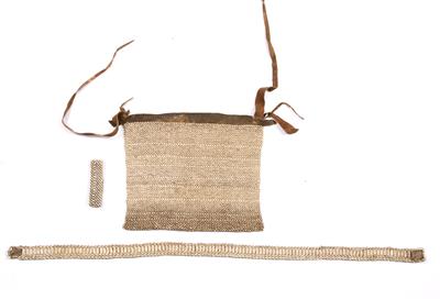 Lot 263 - A BUSHMAN'S LARGE LOIN PIECE with ostrich shell beads and hide border