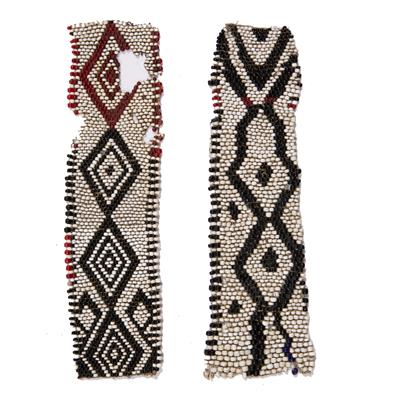 Lot 265 - A MBAKUSHU WOMAN'S BACK APRON with black