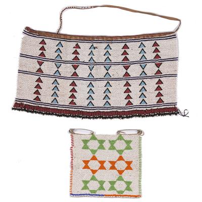 Lot 269 - A FINGO IPHOCO GIRL'S BEADED APRON with horizontal rows of triangular designs