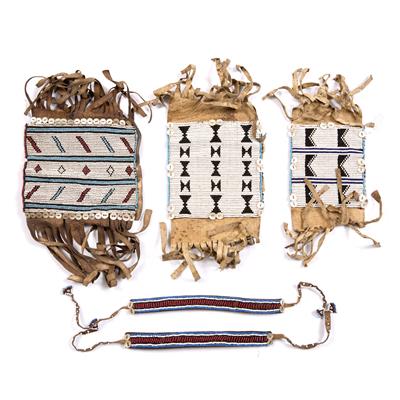 Lot 271 - A PAIR OF XHOSA BEADED AND MOTHER OF PEARL MEN'S LEGGINGS of ritual significance; a Fengu anklet