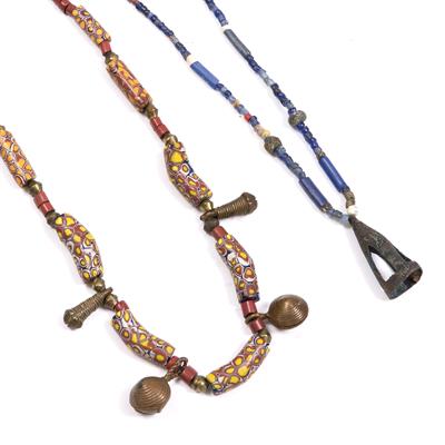 Lot 282 - A DOGAN NECKLACE with curved millefiori glass Venetian beads; and a Njenne Mali necklace with blue