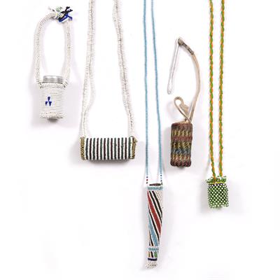 Lot 292 - A XHOSA BEADED MEDICINAL HORN with another beaded necklace and tubular pendant; and three snuff
