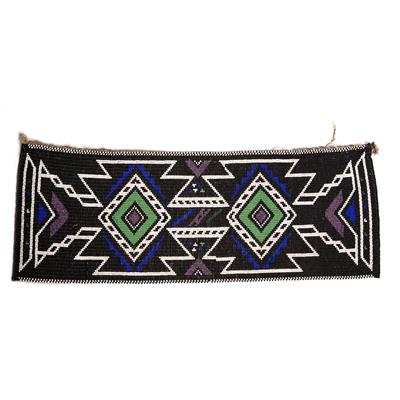 Lot 300 - A HAMBU KUSHU WOMAN'S BEADWORK BACK APRON with geometric formal pattern in black