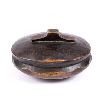Lot 332 - AN AFRICAN OVAL WOODEN BOX AND COVER deep brown patina and of adzed form