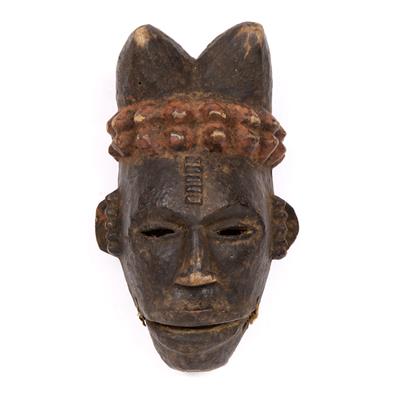 Lot 340 - AN AFRICAN WOODEN ANANG EKPO PUPPET MASK with movable jaw