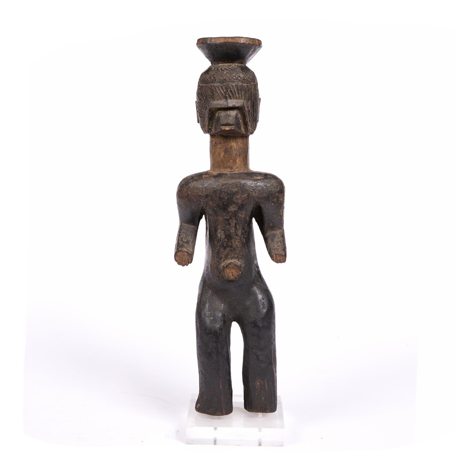 Lot 350 - A MUMEYE STYLE WOODEN FIGURE in standing pose with scratch carved decoration to the head