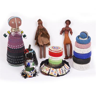 Lot 360 - A NDEBELE FERTILITY DOLL of multi-coloured beaded form