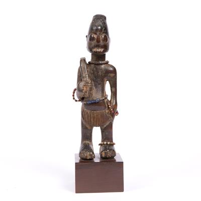 Lot 370 - A FINE YORUBA WOODEN FIGURE carved in the form of Eshu for Shango with multi-coloured trade beads