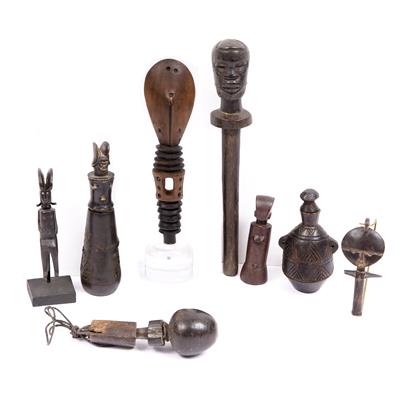 Lot 374 - A MAKONDE WOODEN MEDICINE BOTTLE AND STOPPER