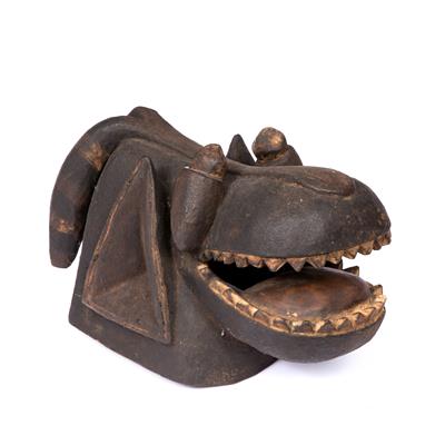 Lot 378 - AN AFRICAN MASK of hippo like form with polychrome decoration and gaping mouth