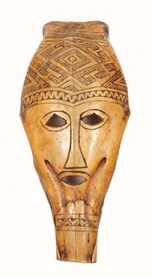 Lot 435 - A CARVED BIRD SKULL 'MASK'