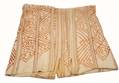 Lot 441 - A PANARE AMAZON INDIAN SOUTH AMERICAN WHITE COTTON PONCHO with hand-painted ochre geometric designs