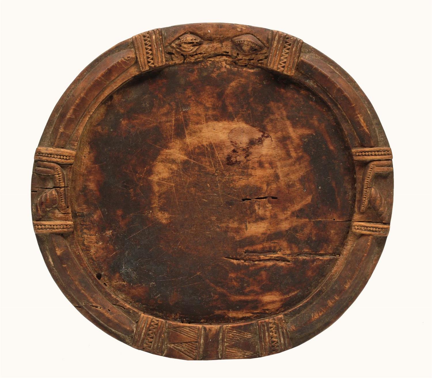 Lot 444 - A YORUBA WEST AFRICAN 'OPON IFA' DIVINATION BOARD with eye motif and magical compartment in the base