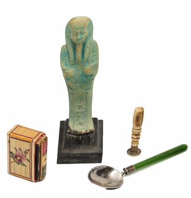 Lot 453 - AN EGYPTIAN FAIENCE SHABTI