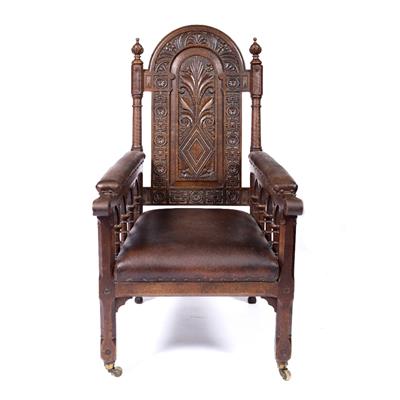 Lot 45 - Gothic style carved oak armchair