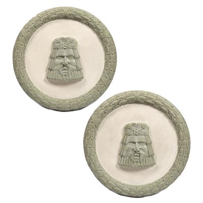 Lot 72 - Pair of carved wood roundels