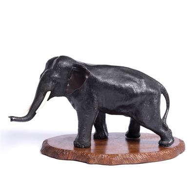 Lot 408 - Bronze model of a standing elephant with forward stretched trunk