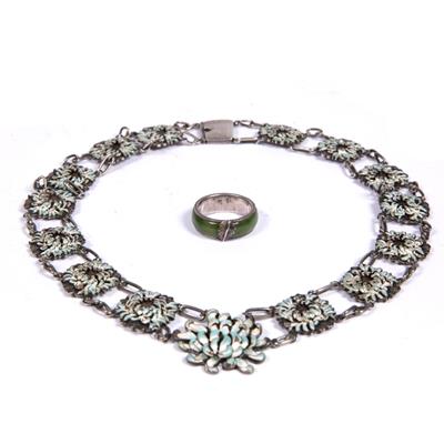 Lot 439 - Chinese white metal and jade ring
