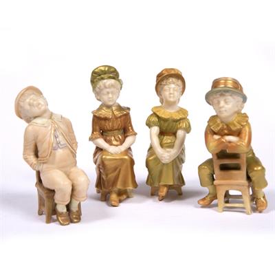 Lot 483 - Four Royal Worcester small figures of Kate Greenaway children