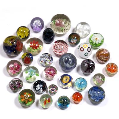 Lot 563 - Thirty one paperweights