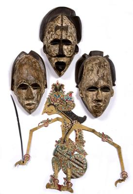 Lot 607 - Three carved and painted tribal masks