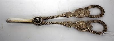 Lot 2 - A PAIR OF VICTORIAN SILVER GRAPE SCISSORS with cherub mask and foliate decoration and marks for