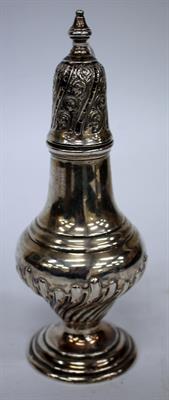Lot 23 - A 20TH CETNURY SILVER SUGAR CASTOR of baluster form with half gadrooned body