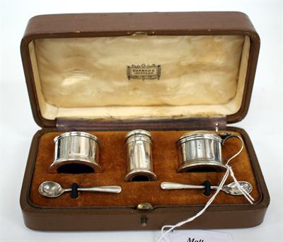 Lot 39 - A SILVER CRUET SET with blue glass lining in a fitted Harrods box