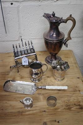 Lot 44 - A HARRODS SILVER PLATED SIX DIVISION TOAST RACK AND STAND the stand set with spirit burner together