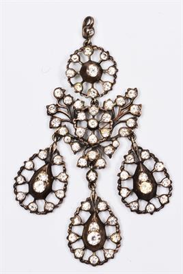Lot 58 - A VICTORIAN PASTE PENDANT WITH STYLISED FLOWERHEAD DESIGN and three pear shaped drops together with