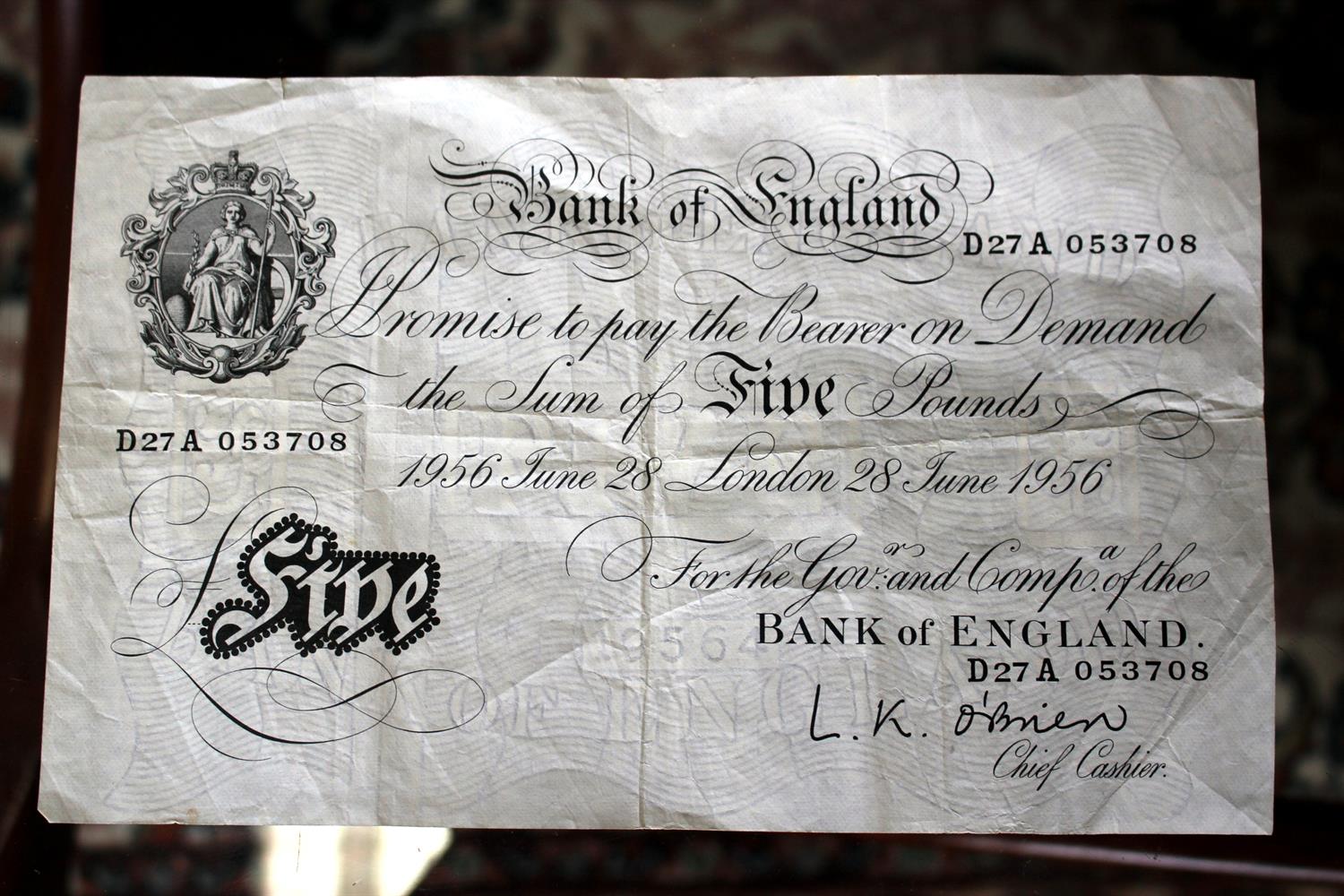 Lot 69 - A BANK OF ENGLAND WHITE FIVE POUND NOTE dated June 28th 1956 and with cashiers signature L.K.