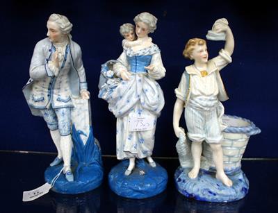 Lot 73 - THREE VARIOUS BLUE DECORATED CONTINENTAL FIGURINES one of a lady with a child and a basket of