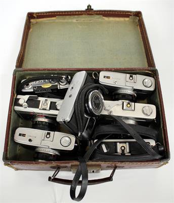 Lot 92 - SEVEN VINTAGE CAMERAS to include three Olympus Trip 35 cameras