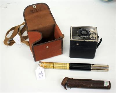 Lot 93 - AN OTIS KINGS PATENT CALCULATOR with original leather case and a Kodak brownie camera (2)