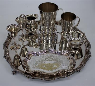 Lot 96 - A LARGE SILVER PLATED PIE CRUST EDGE SALVER the crest crossed oak branches 42cm diameter together