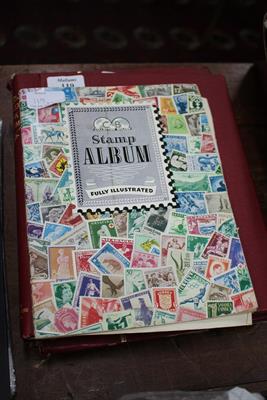 Lot 119 - FOUR STAMP ALBUMS OF MISCELLANEOUS WORLD STAMPS