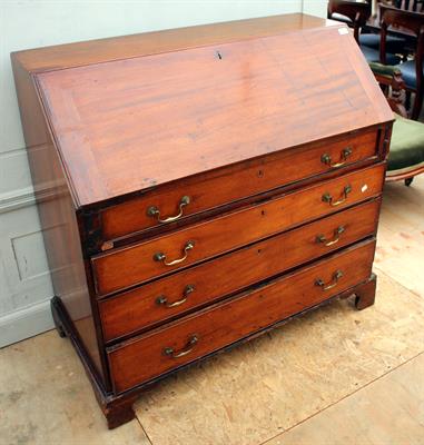 Lot 167 - A GEORGIAN MAHOGANY BUREAU the fall front enclosing a fitted interior above four drawers and
