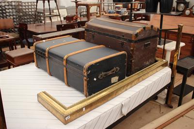 Lot 172 - A VICTORIAN BRASS FENDER together with an old domed topped travelling trunk and a further trunk (3)